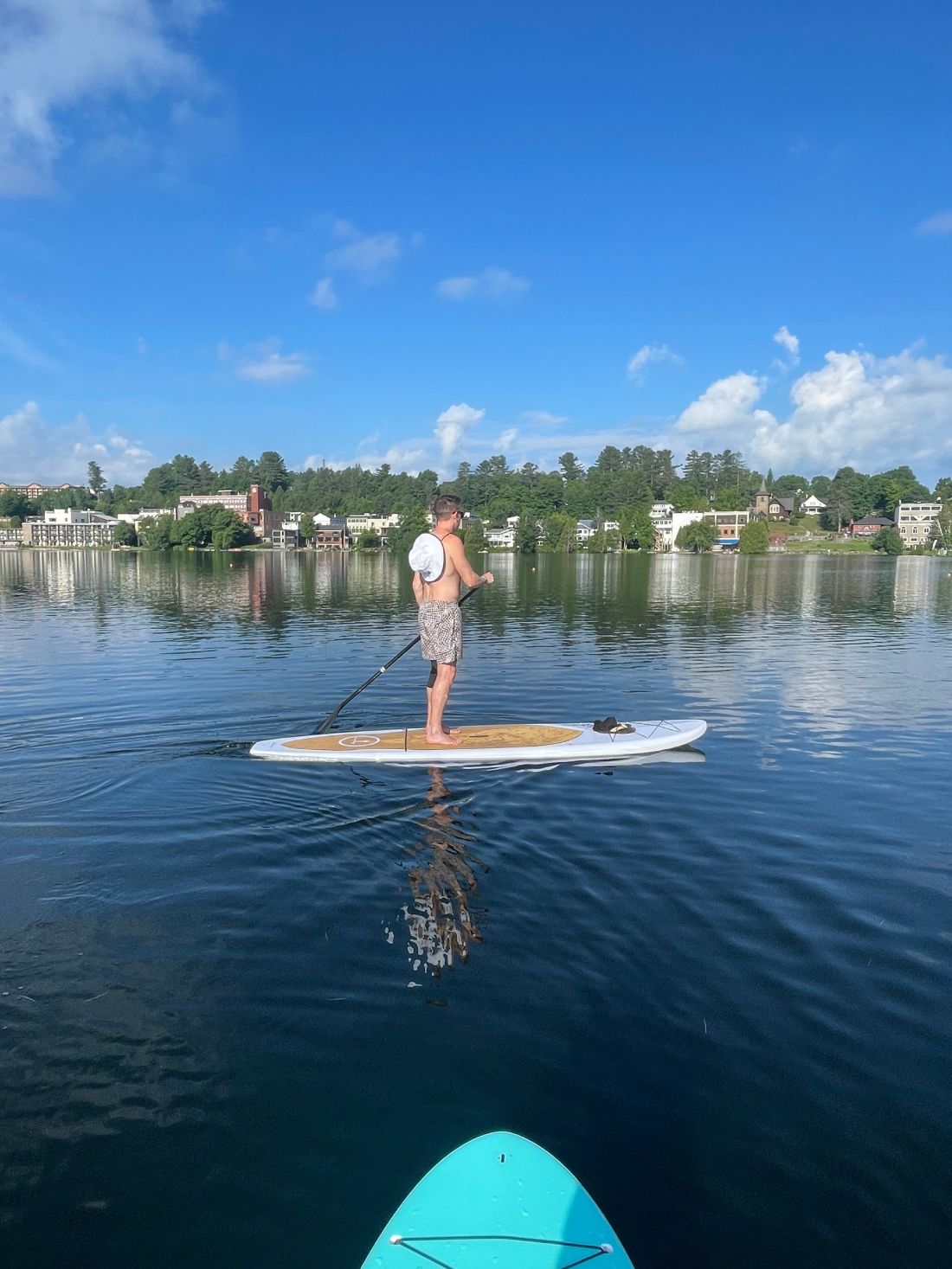 Paddling past the village on Mirror Lake